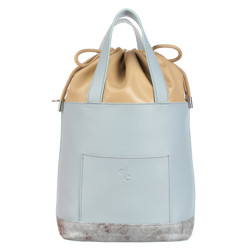 In the grey bucket bag caramel pouch