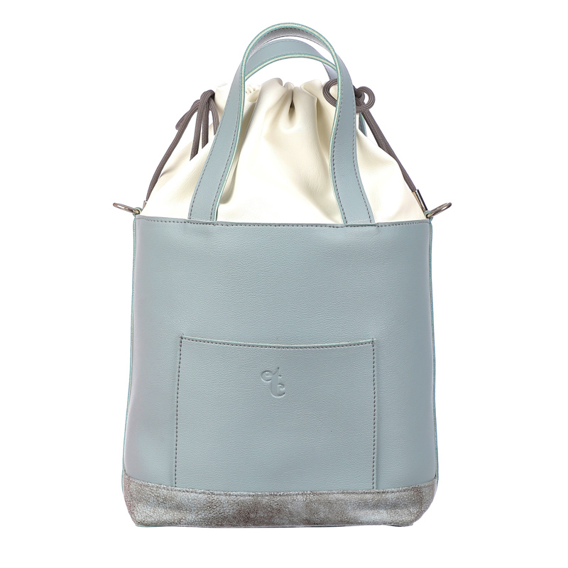 In the grey bucket bag white pouch